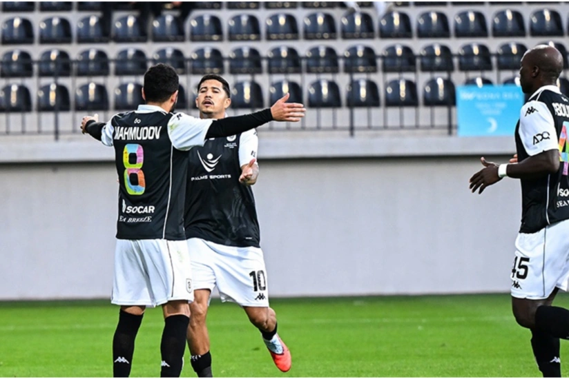 Emin Mahmudov "ağ-qaralar"ın formasında "100"ü yarıladı